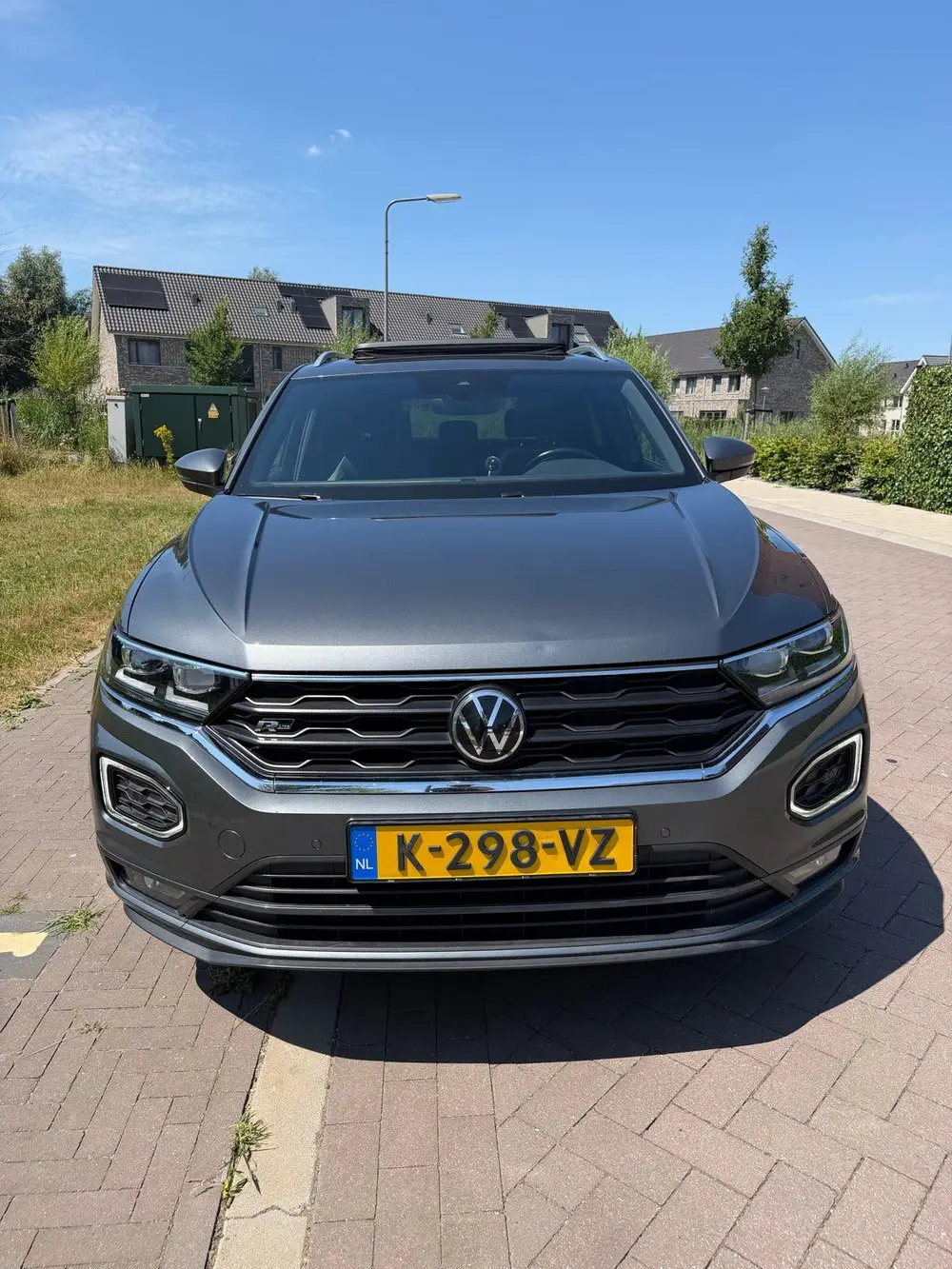 Volkswagen T-Roc 1.5 TSI 150pk 7-DSG 2021 Grijs PANO KEYLESS uit 2021