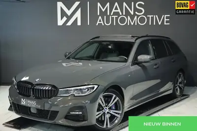 BMW 3-Serie 330i xDrive M Sport / PANO / LASER / HUD / MEMOR uit 2020