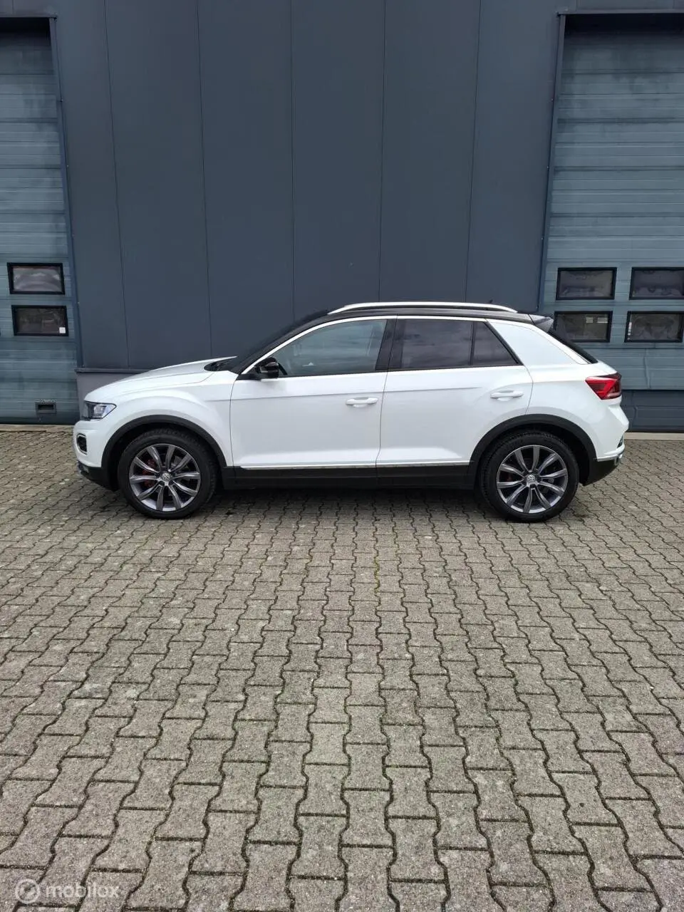 Volkswagen T-Roc 1.5 TSI Sport R 4Motion |Pano|Leder| uit 2019, foto 5
