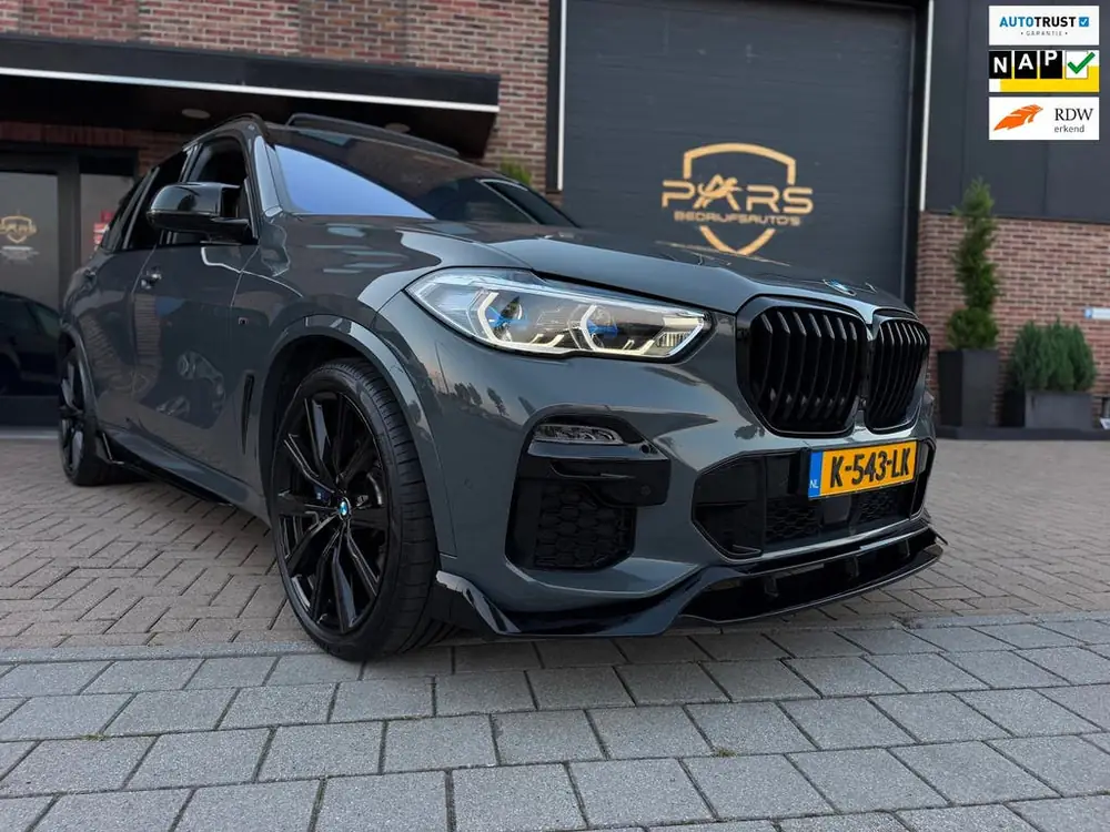 BMW X5 XDrive45e High Executive + M Performance Dravitgrau L uit 2021